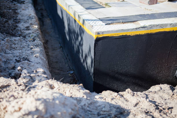 Professional Basement Waterproofing technician working in Benton Ridge, OH